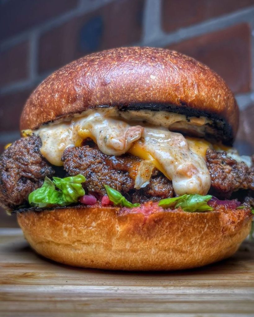 We share a delicious jerk burger recipe created collaboratively with the Edible Bible on Instagram.